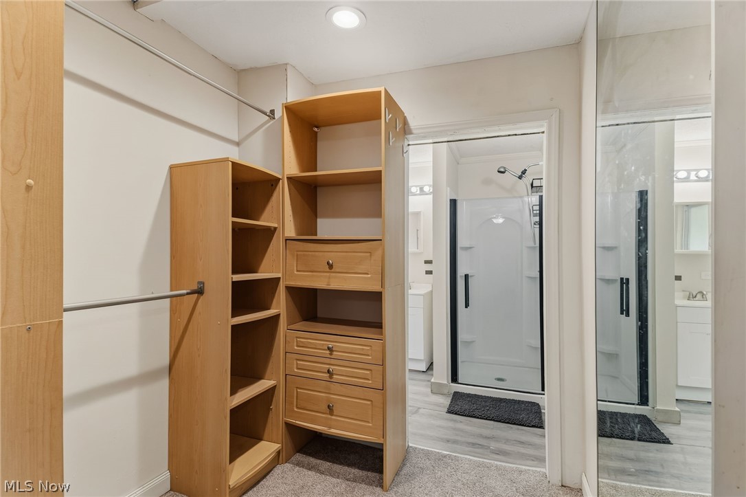 4619 Ridge Avenue Southeast Canton, OH 44707 - Photo 16 of 26 Custom wood-finish shelving and drawer storage systems
