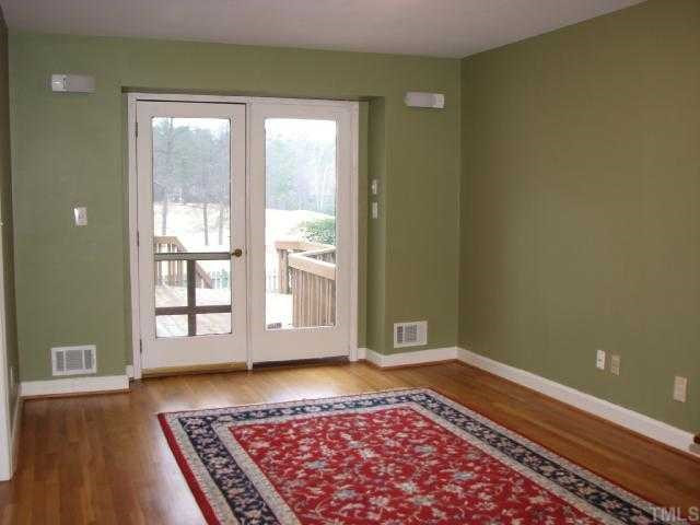 1409 Hunting Ridge Road Raleigh, NC 27615 - Photo 7 of 12 From the first floor study, you can enjoy views of the golf course. View