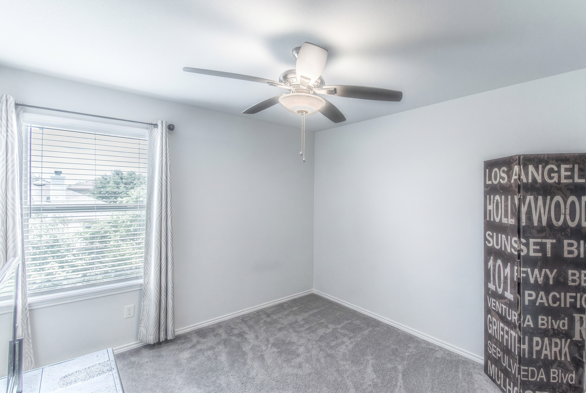 192 Spotted Rail Ridge Leander, TX 78641 - Photo 11 of 34 a view of an empty room with a window