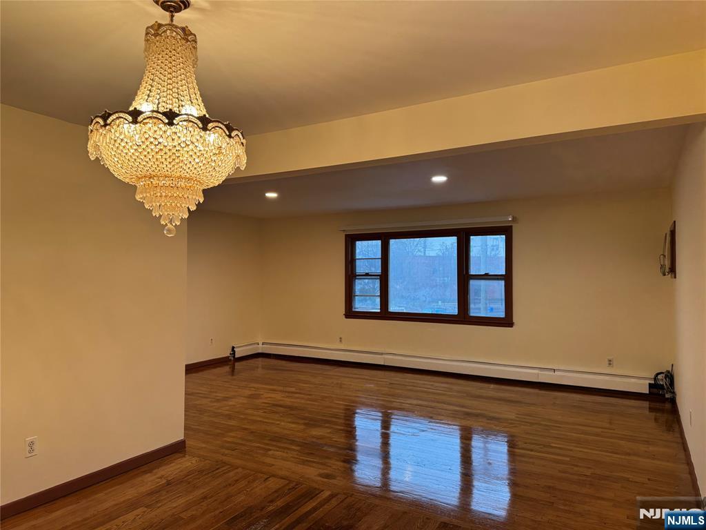 4 Chestnut Street Rutherford, NJ 07070 - Photo 16 of 29 a view of a room with wooden floor and staircase