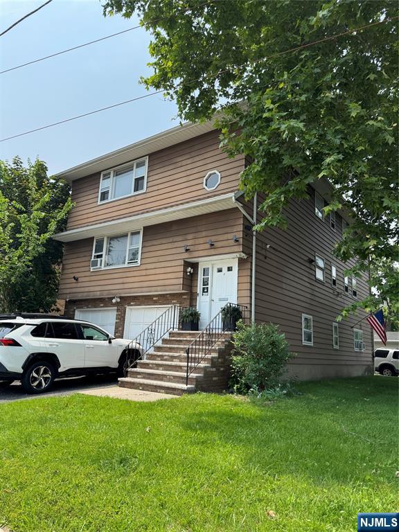 4 Chestnut Street Rutherford, NJ 07070 - Photo 2 of 29 a house view with a garden space