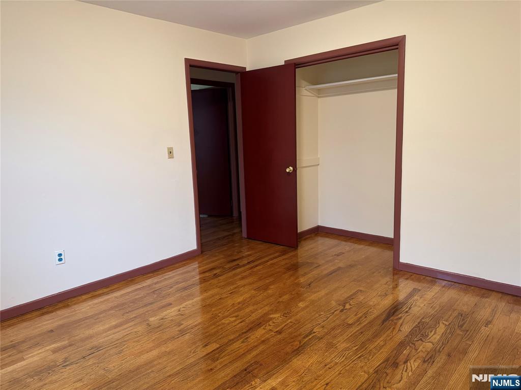 4 Chestnut Street Rutherford, NJ 07070 - Photo 24 of 29 a view of an empty room with wooden floor and closet
