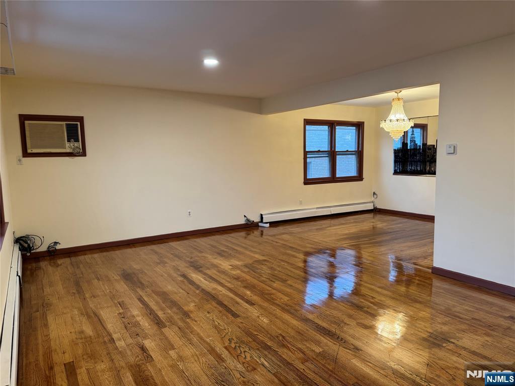 4 Chestnut Street Rutherford, NJ 07070 - Photo 5 of 29 wooden floor in a hall with a window