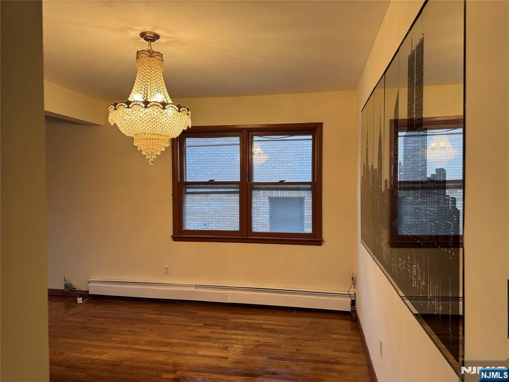 4 Chestnut Street Rutherford, NJ 07070 - Photo 9 of 29 a view of a livingroom with wooden floor and staircase