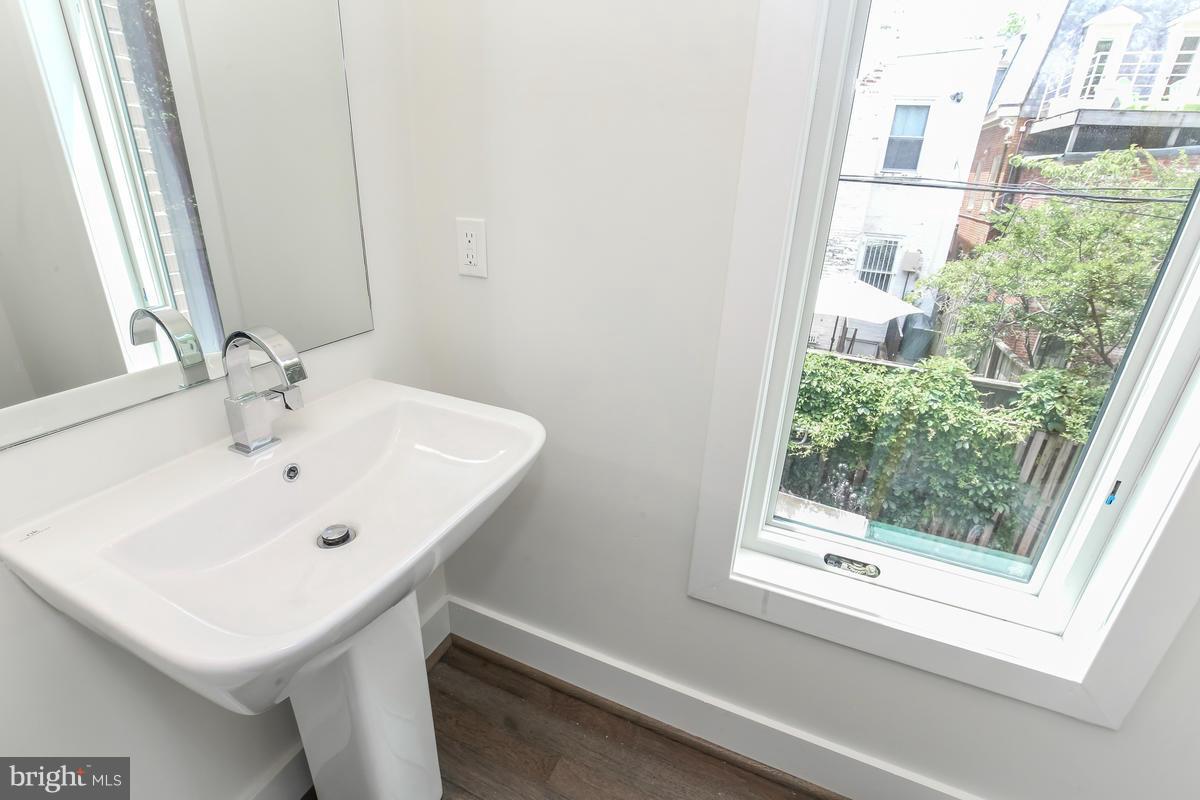 460 Ridge Street Northwest, Unit 4 Washington, DC 20001 - Photo 13 of 30 Half Bathroom on Main-Upper Level