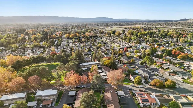 an aerial view of residential building with parking space