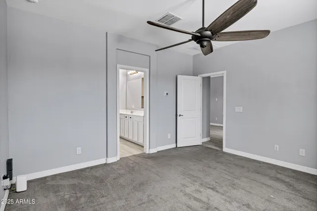 a view of a ceiling fan in a room