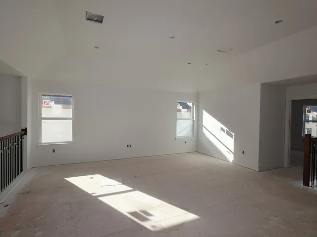 an empty room with windows