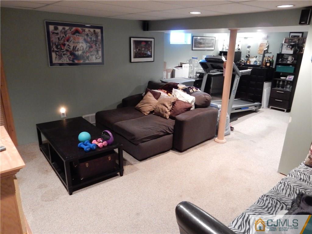 61 Kimberly Road Colonia, NJ 07067 - Photo 17 of 25 a living room with furniture