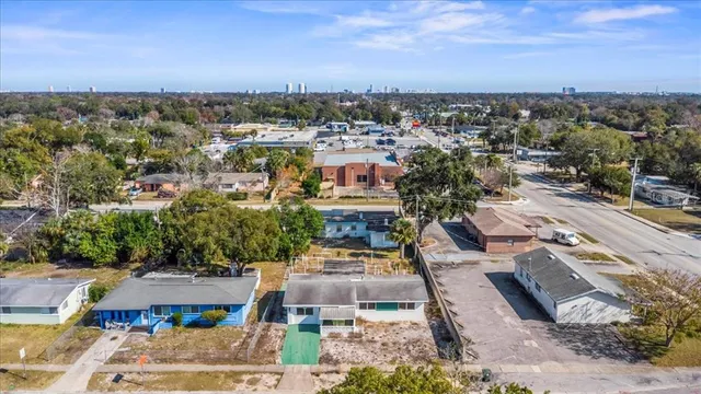 an aerial view of a city with lots of residential buildings