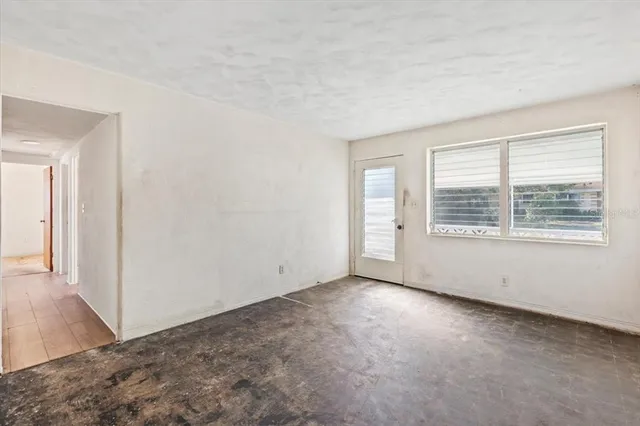 an empty room with windows