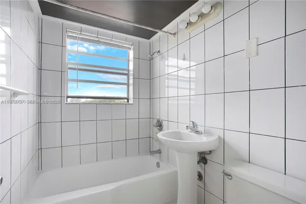 a view of a house with a street