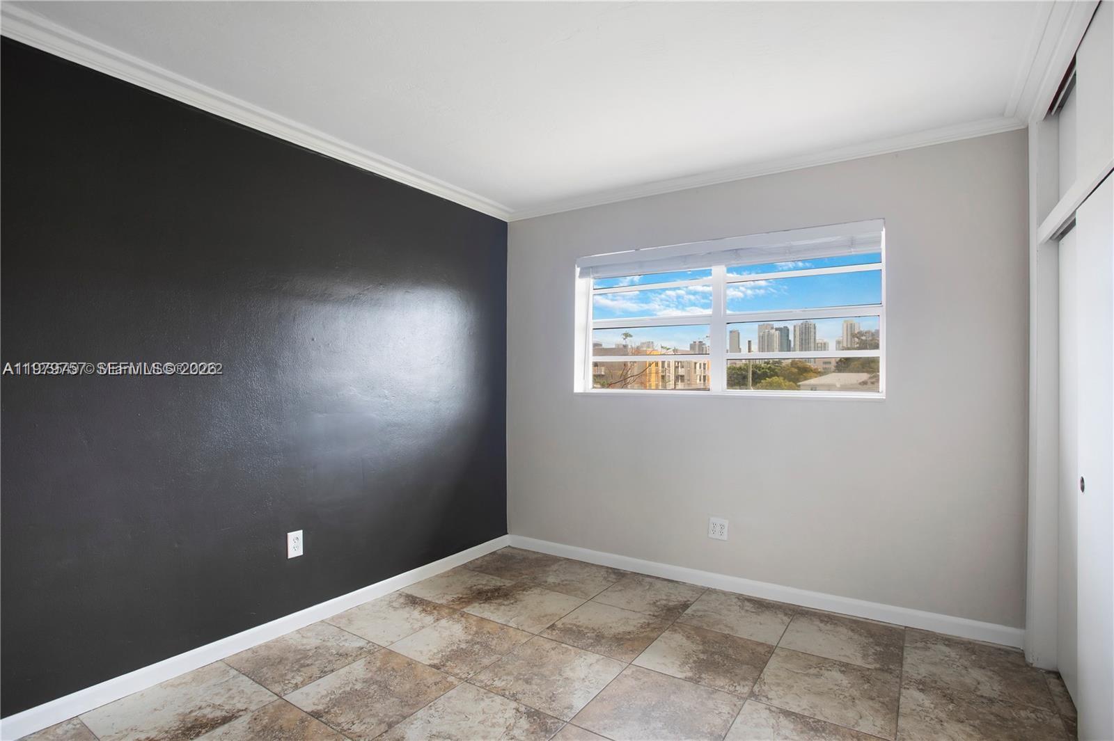 1020 Southwest 7th Street, Unit 9 Miami, FL 33130 - Photo 8 of 13 a view of an empty room