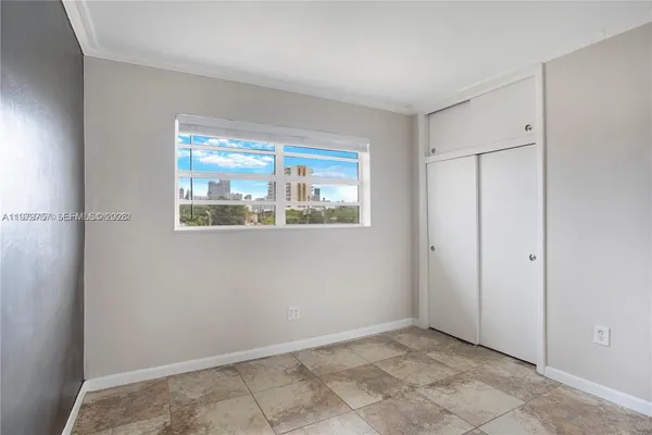 a view of a room with a window