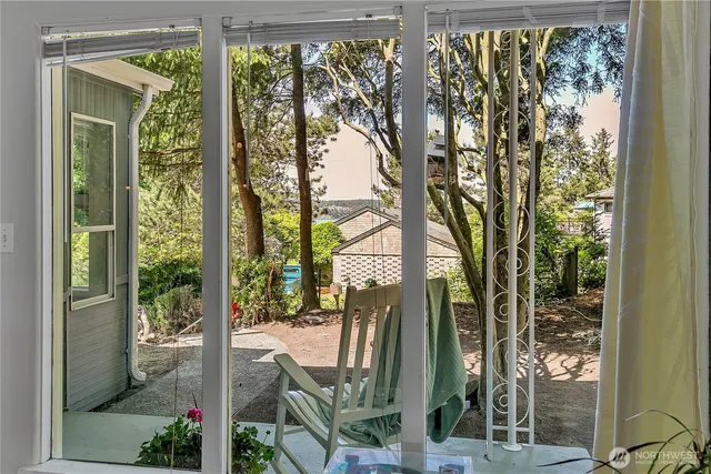 a view of a garden from a porch