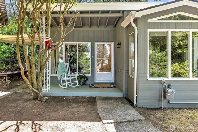 a view of outdoor space and front view of a house