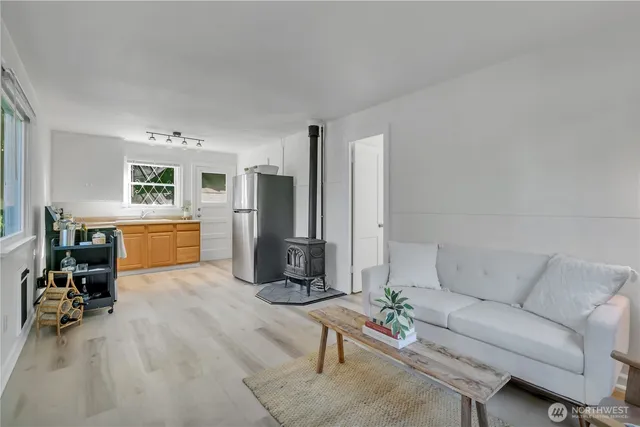a living room with furniture and a table