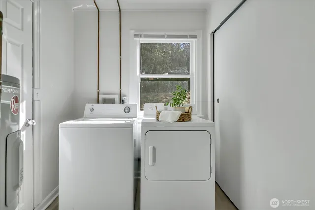 a utility room with dryer and washer