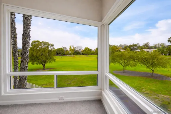 a view of swimming pool from a window