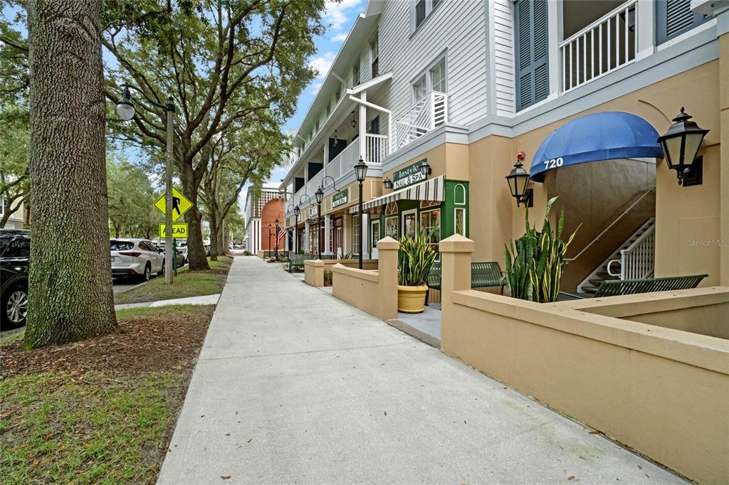 720 Celebration Avenue, Unit 220 Celebration, FL 34747 - Photo 3 of 45 a view of a building with a street