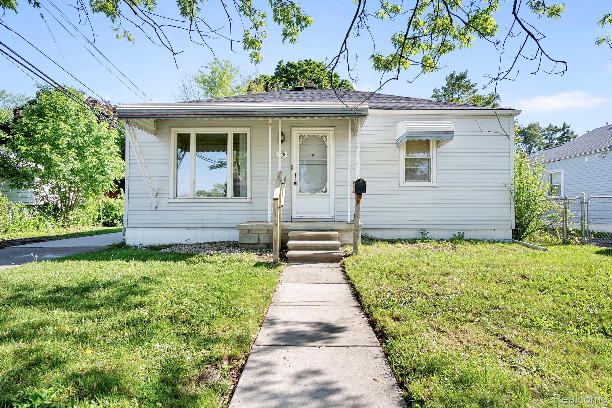 970 Champaign Road Lincoln Park, MI 48146 - Photo 11 of 28 View of bungalow-style house