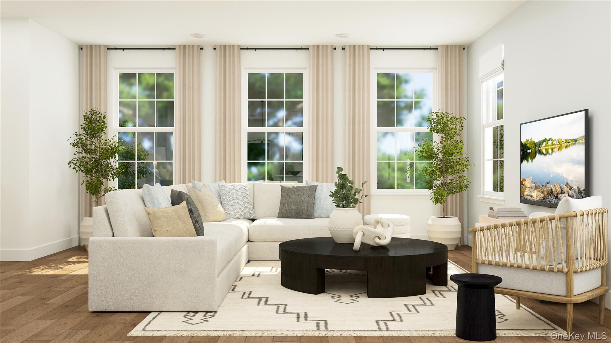 a living room with furniture and large windows