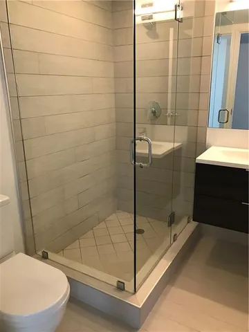 a view of swimming pool with a lounge chair