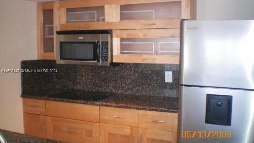 540 Brickell Key Drive, Unit 1511 Miami, FL 33131 - Photo 3 of 24 a bathroom with a sink and a shower