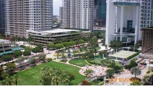540 Brickell Key Drive, Unit 1511 Miami, FL 33131 - Photo 5 of 24 a view of swimming pool patio and outdoor seating