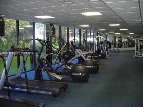 540 Brickell Key Drive, Unit 1511 Miami, FL 33131 - Photo 6 of 24 a view of a room with gym equipment