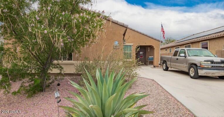 a view of a couches in patio of a house