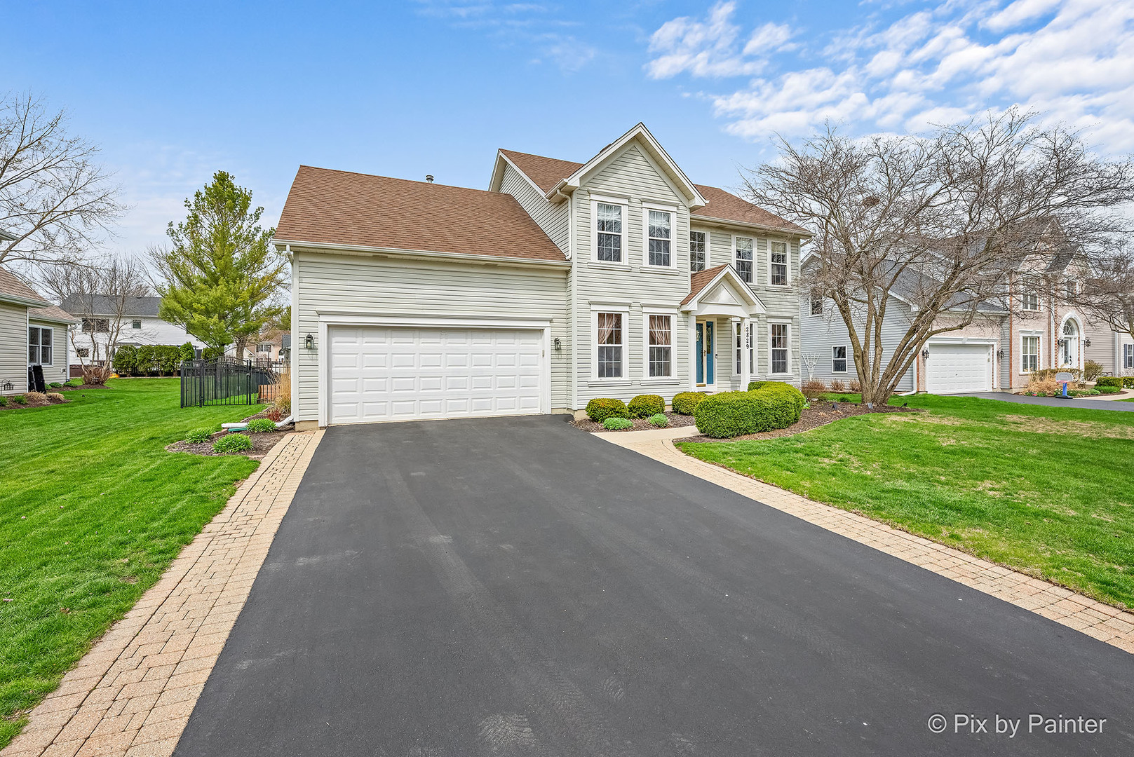 2829 Miller Road Geneva, IL 60134 - Photo 1 of 1 a front view of a house with a yard and garage