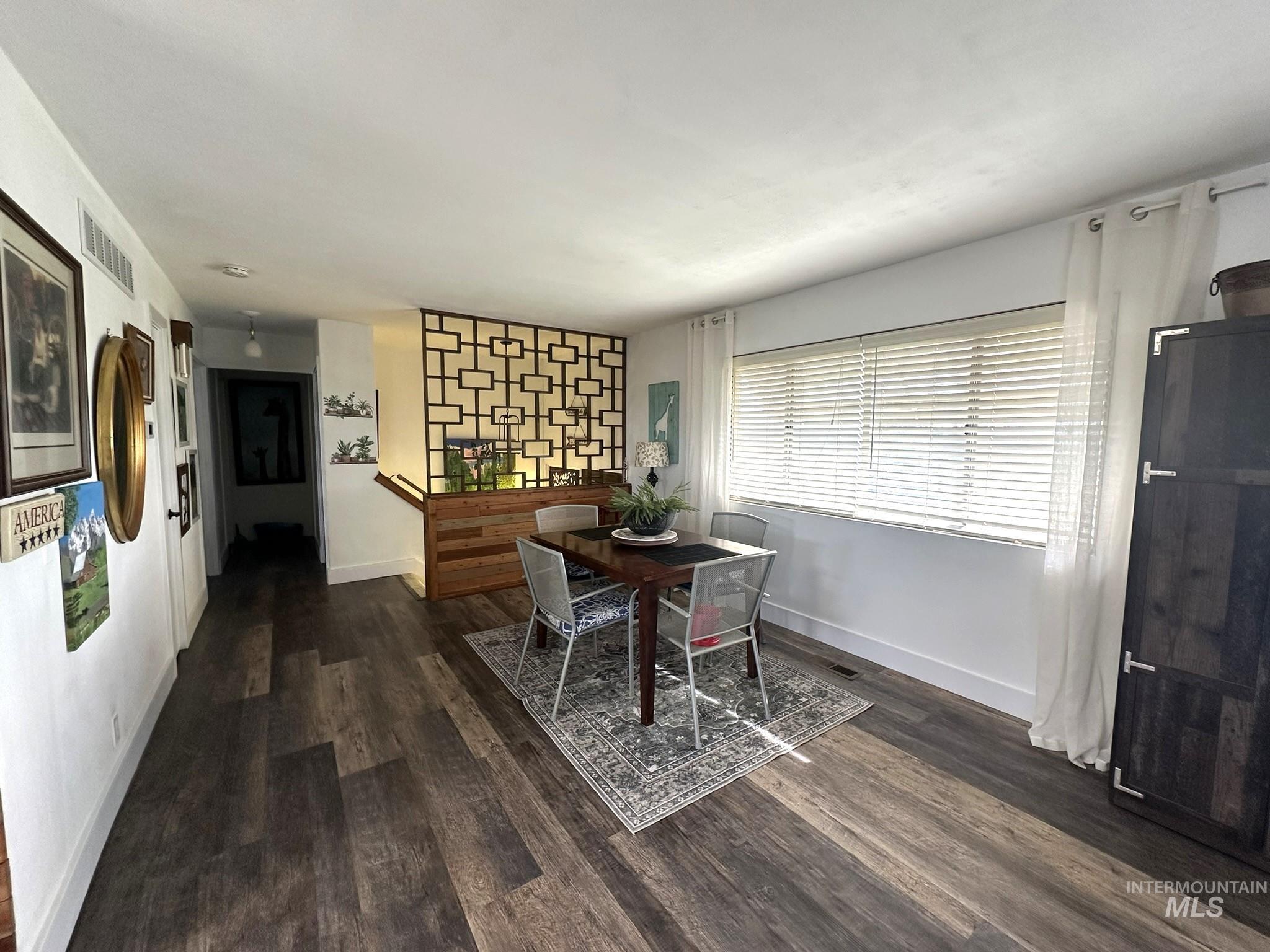4436 Baker Road Ontario, OR 97914 - Photo 11 of 30 Dining space featuring dark wood-type flooring