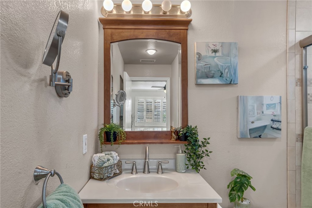 5142 West 142nd Street Hawthorne, CA 90250 - Photo 29 of 56 a living room with furniture and flowers