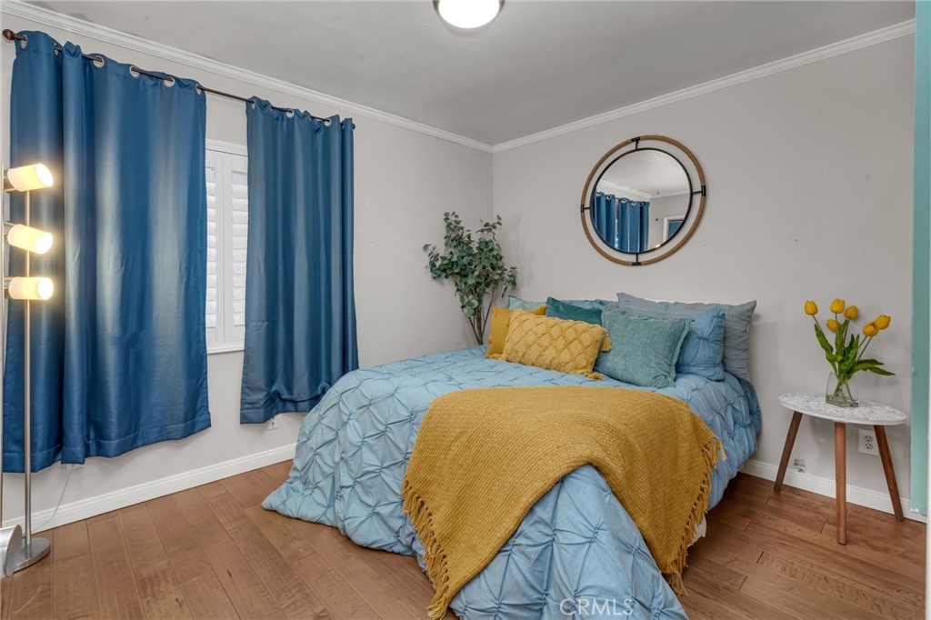 5142 West 142nd Street Hawthorne, CA 90250 - Photo 38 of 56 a bedroom with bed and a window