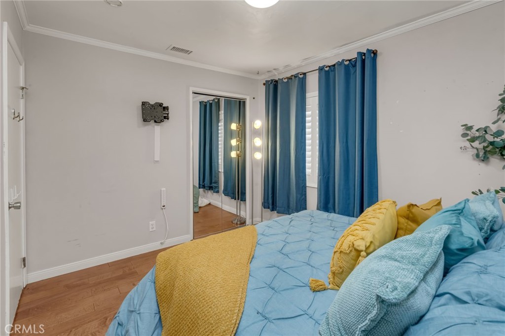 5142 West 142nd Street Hawthorne, CA 90250 - Photo 40 of 56 a bedroom with a bed and a window