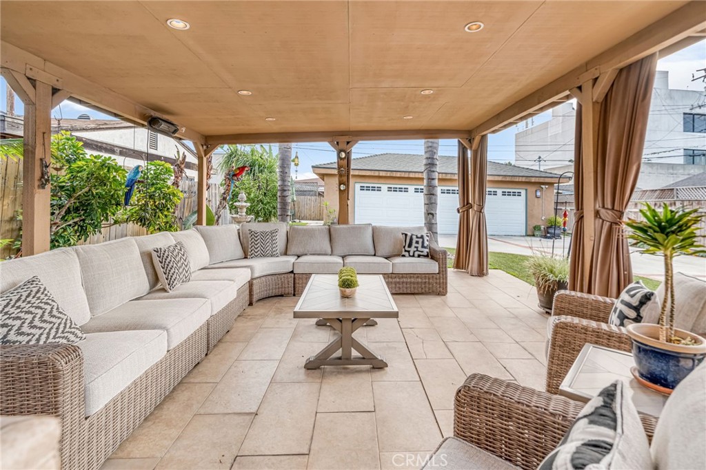 5142 West 142nd Street Hawthorne, CA 90250 - Photo 46 of 56 a living room with furniture and a large window