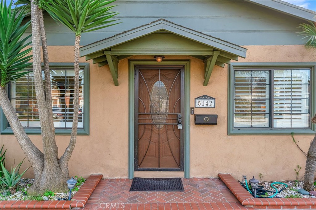 5142 West 142nd Street Hawthorne, CA 90250 - Photo 5 of 56 a front view of a house with a yard