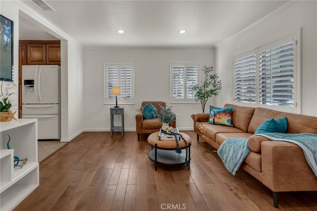 5142 West 142nd Street Hawthorne, CA 90250 - Photo 7 of 56 a living room with furniture and a wooden floor