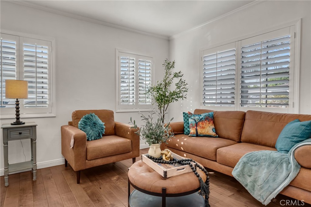5142 West 142nd Street Hawthorne, CA 90250 - Photo 8 of 56 a living room with furniture and a large window