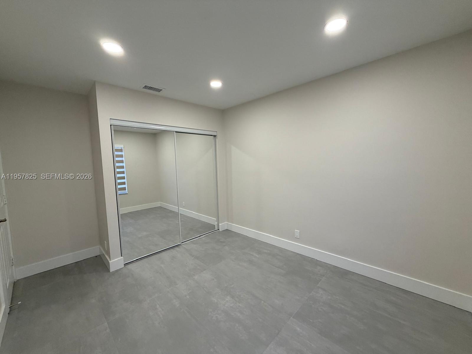 755 Falling Water Road Weston, FL 33326 - Photo 21 of 52 an empty room with an entryway