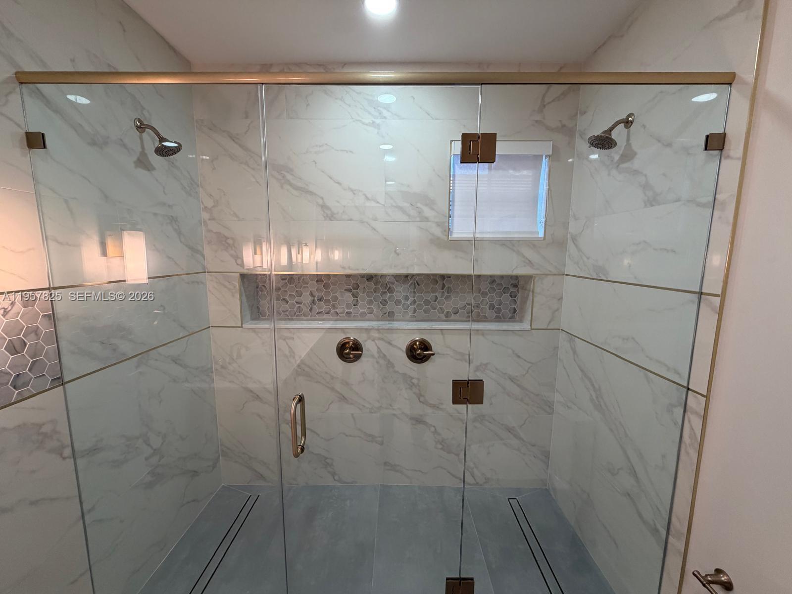 755 Falling Water Road Weston, FL 33326 - Photo 33 of 52 a bathroom with a shower