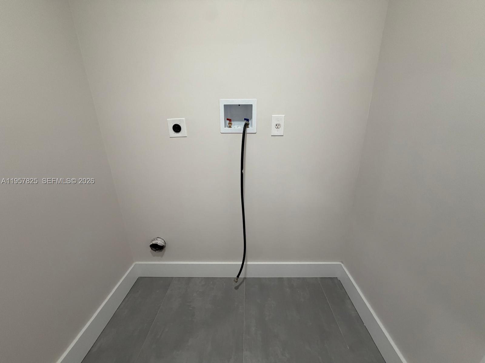 755 Falling Water Road Weston, FL 33326 - Photo 37 of 52 a view of a room with wooden floor