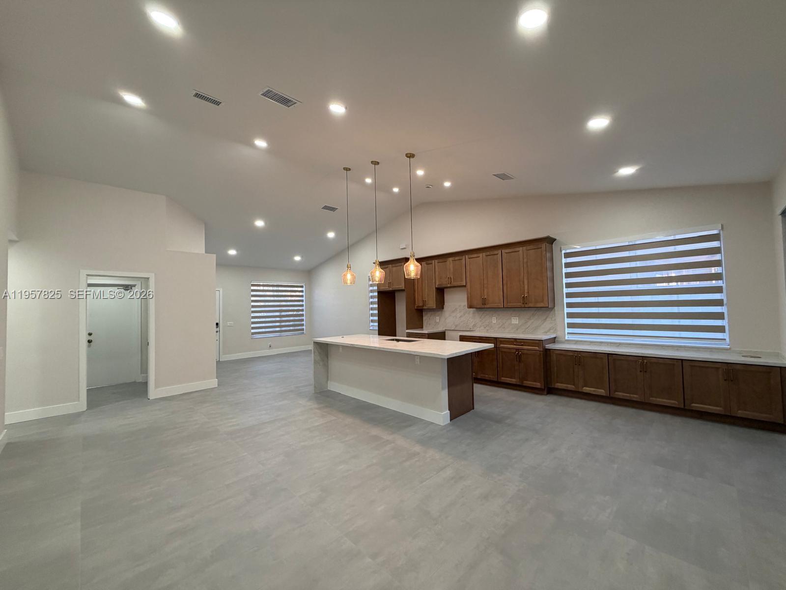 755 Falling Water Road Weston, FL 33326 - Photo 5 of 52 a large living room with a window