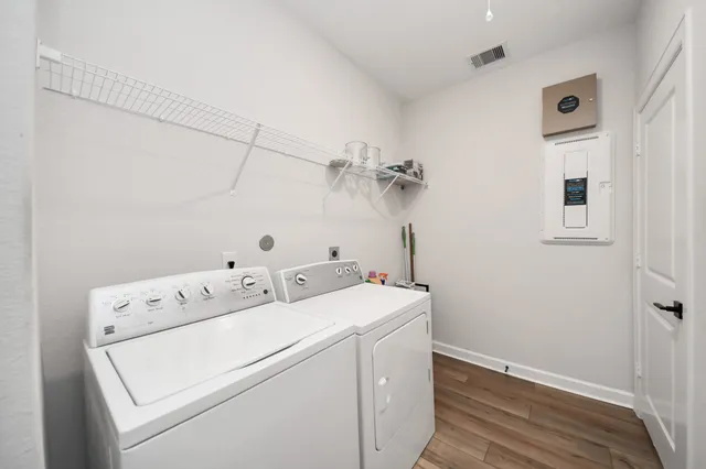 a utility room with dryer and washer