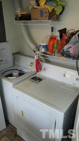 4311 Halliwell Drive Raleigh, NC 27606 - Photo 21 of 21 a bathroom with a sink and a stove