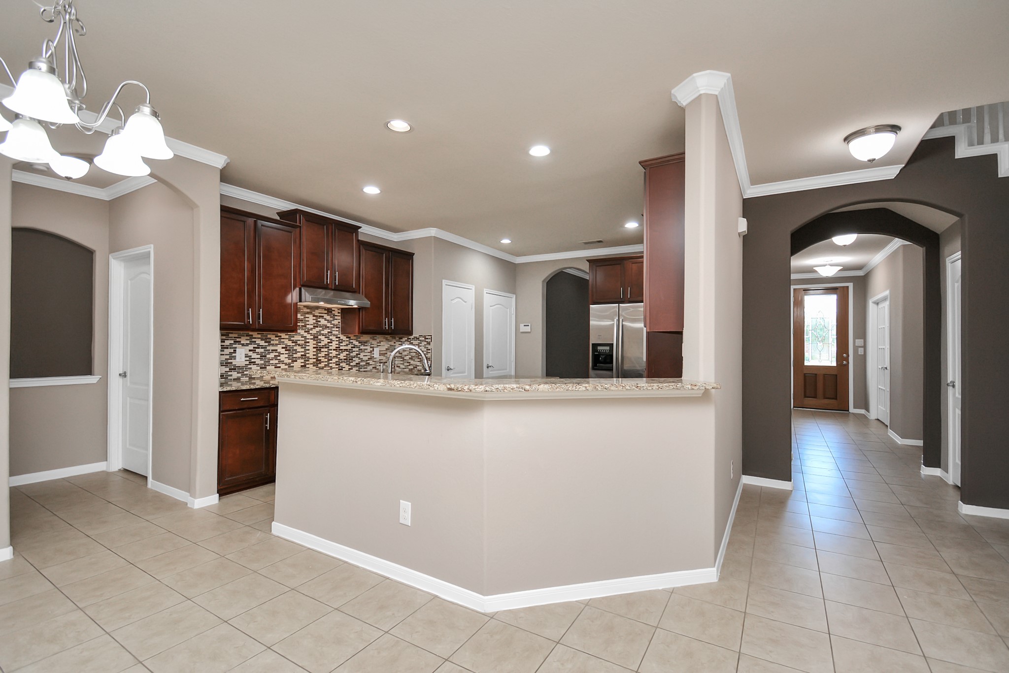 15222 Rigby Point Lane Cypress, TX 77429 - Photo 13 of 35 Great breakfast bar for eating or entertaining!