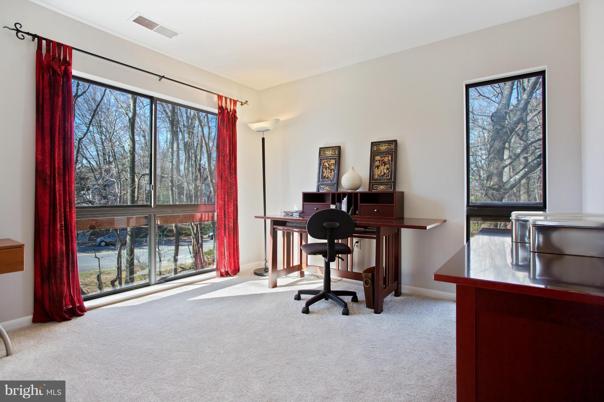2040 Lakebreeze Way Reston, VA 20191 - Photo 20 of 29 a view of a workspace with furniture and a window