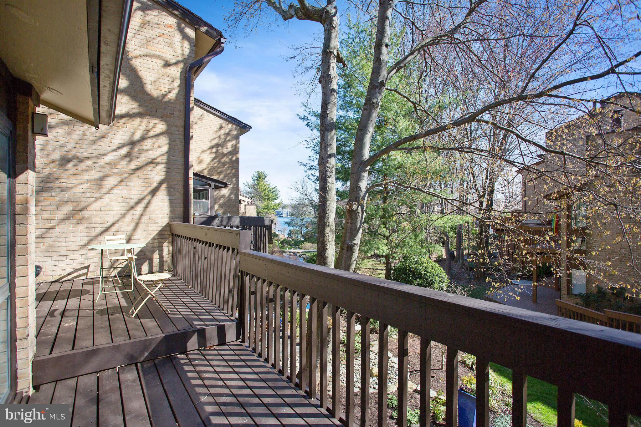 2040 Lakebreeze Way Reston, VA 20191 - Photo 29 of 29 a view of balcony with wooden floor and space