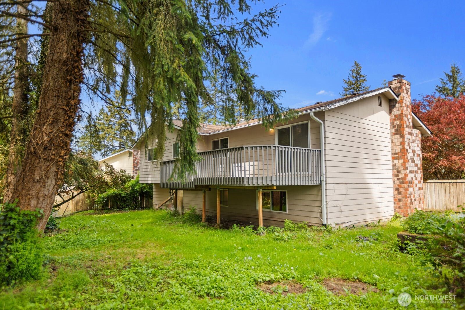 21627 9th Place West Bothell, WA 98021 - Photo 39 of 40 a view of a house with a backyard